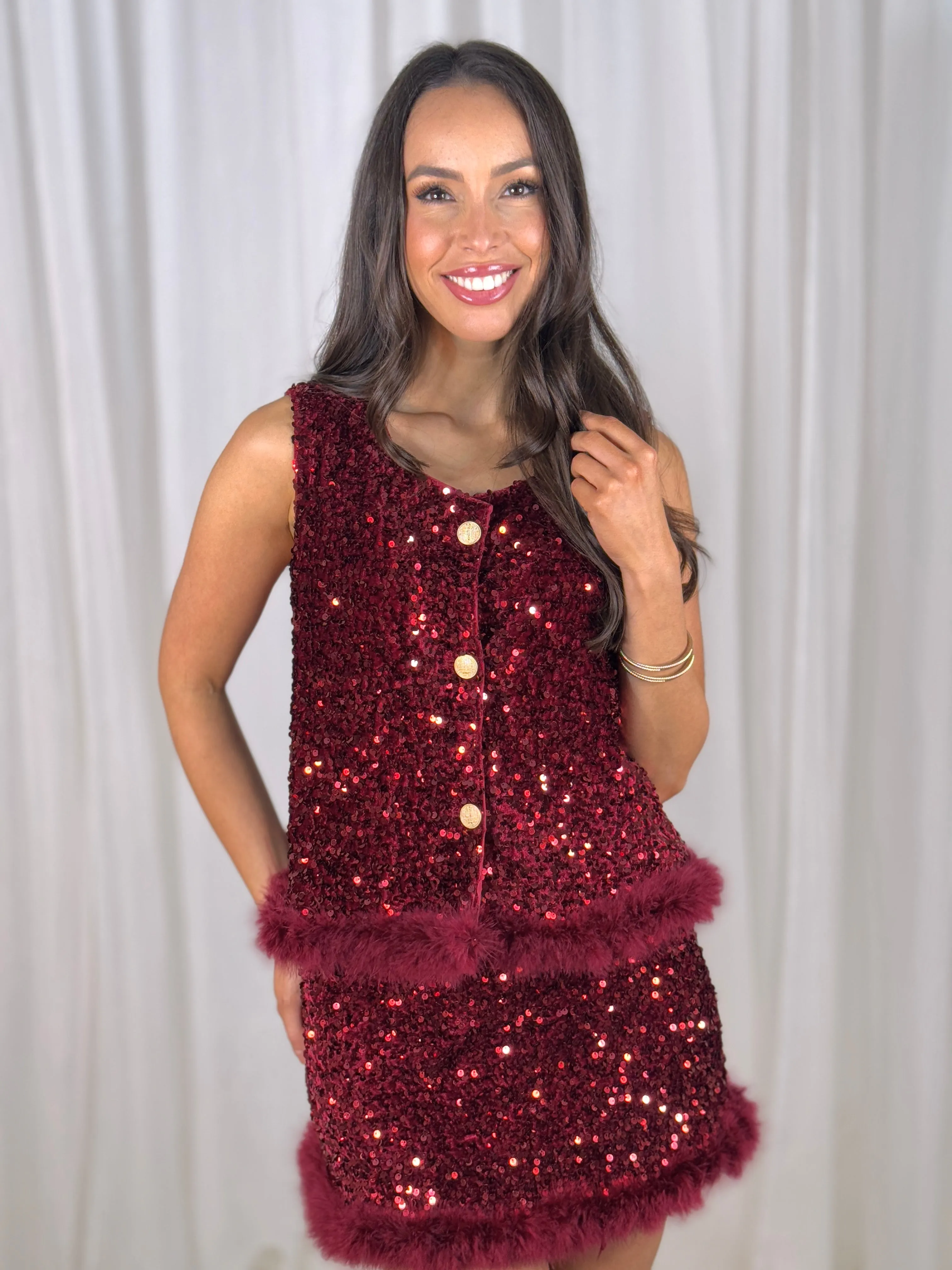 Polly Faux Fur Trim Sequin Waistcoat In Wine